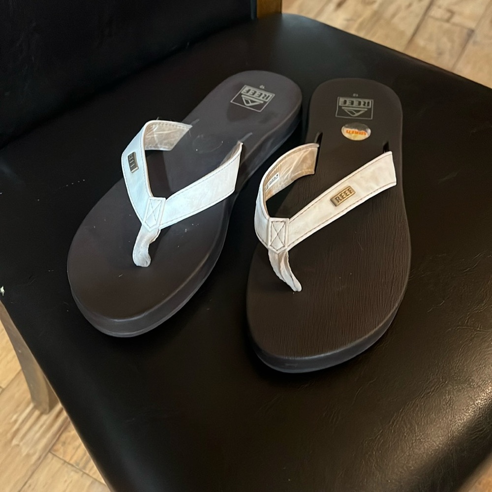 Women's reef size 10 flip-flops. Brown and white.